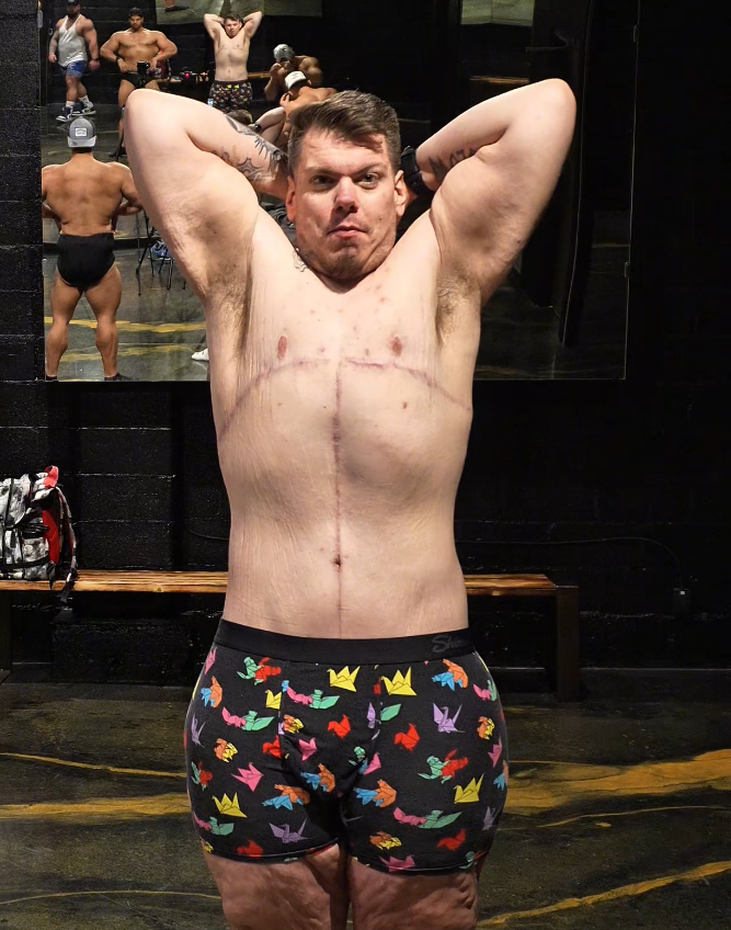 An image of Jesse posing in a gym